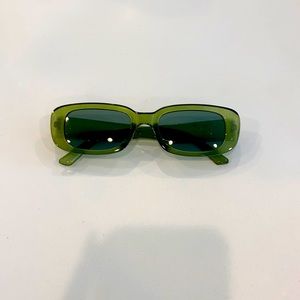 a pair of rectangular green sunglasses